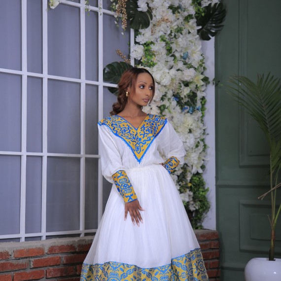 https://dress.habeshadresses.com/products/habesha-kemis-blue-on-yellow